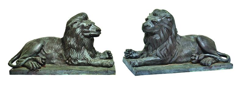 Appraisal: A PAIR OF ARCHITECTURAL BRONZE LION STATUES