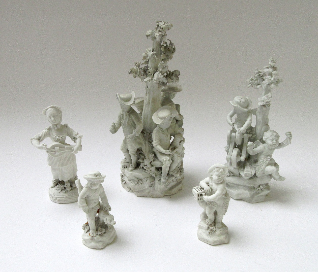 Appraisal: A group of five Derby biscuit porcelain figures and groups