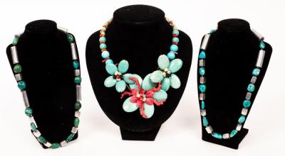 Appraisal: A faux turquoise and coral necklace of multi flowerhead design