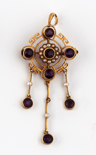 Appraisal: AN AMETHYST AND HALF PEARL PENDANT BROOCH centrally set with