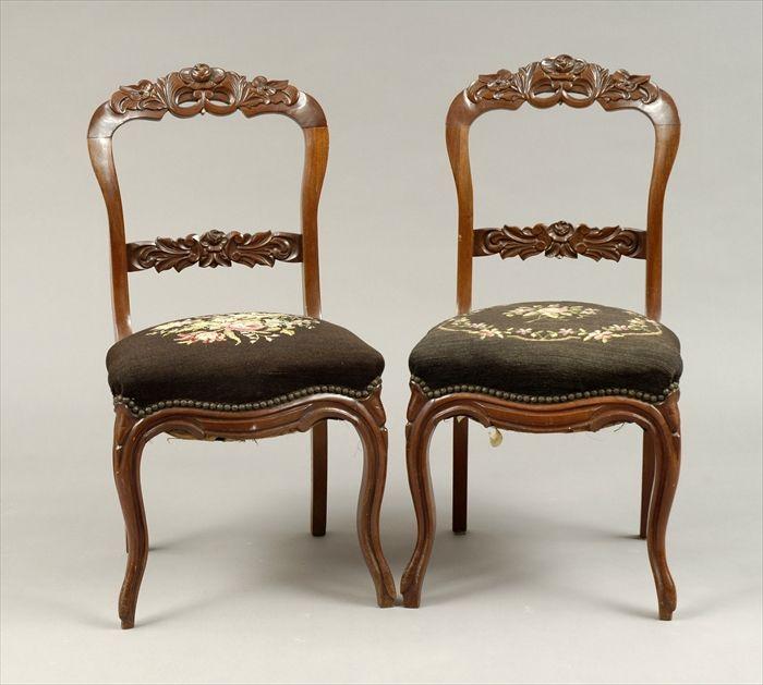 Appraisal: Pair of Rococo Revival Carved Walnut Side Chairs with Needlework-Upholstered