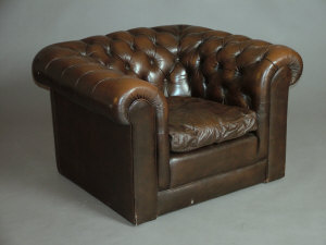 Appraisal: A pair of th century brown leather button back Chesterfield