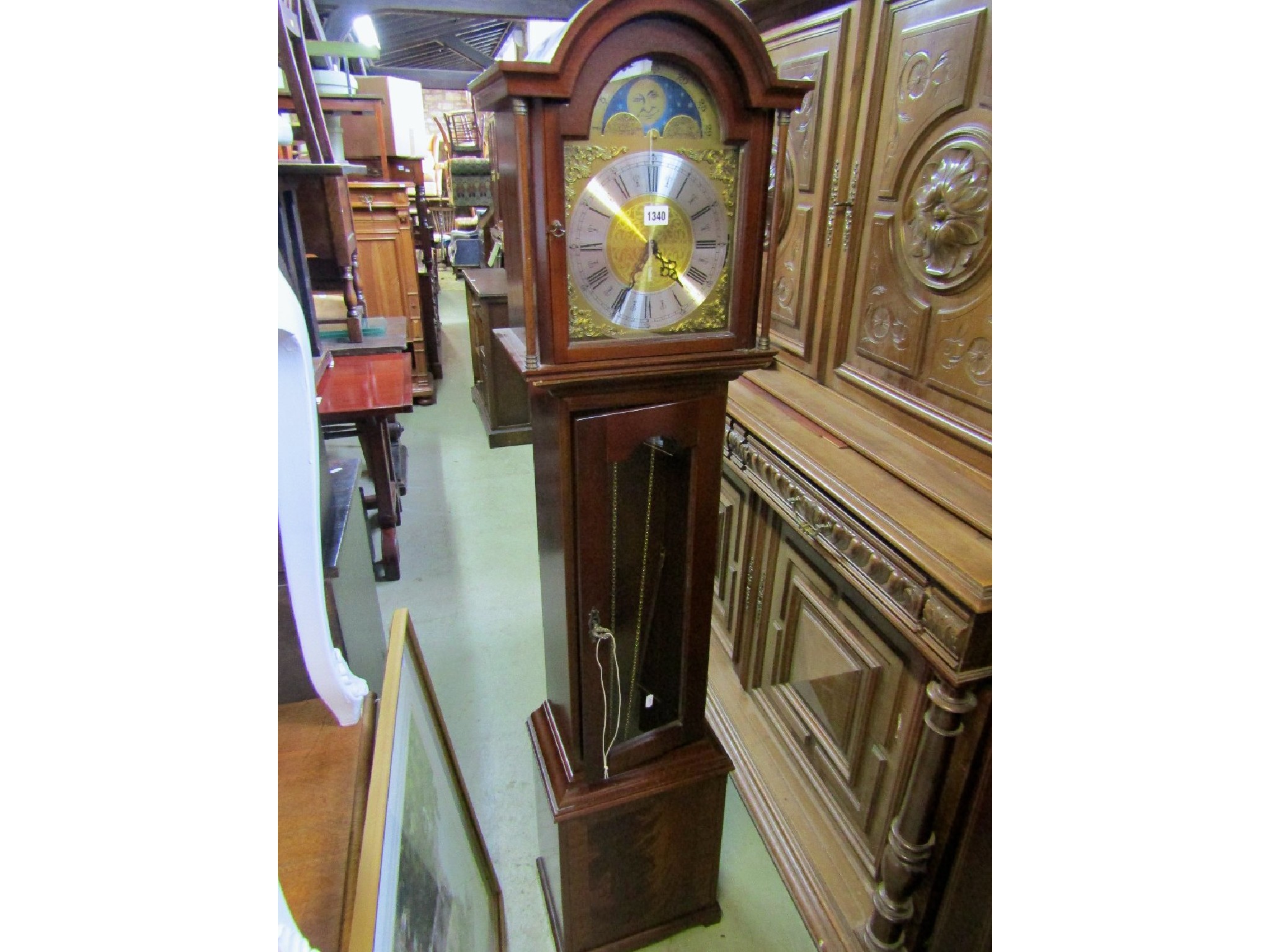 Appraisal: A contemporary reproduction grandmother clock the mahogany case with arched