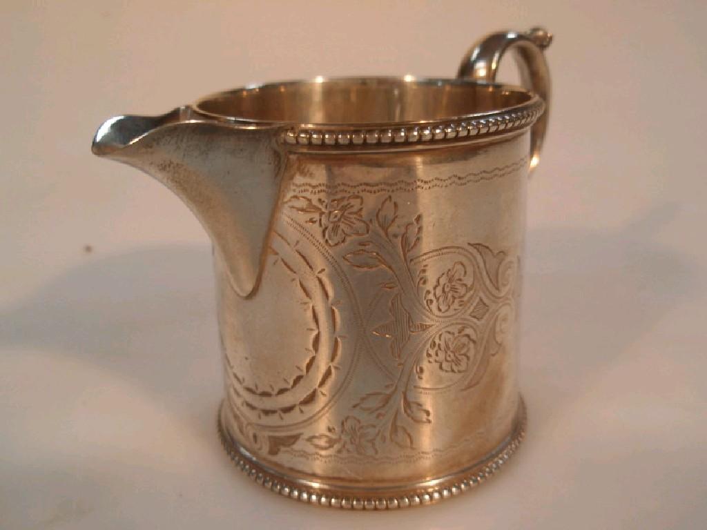 Appraisal: A Victorian silver cream jug the straight sided circular body