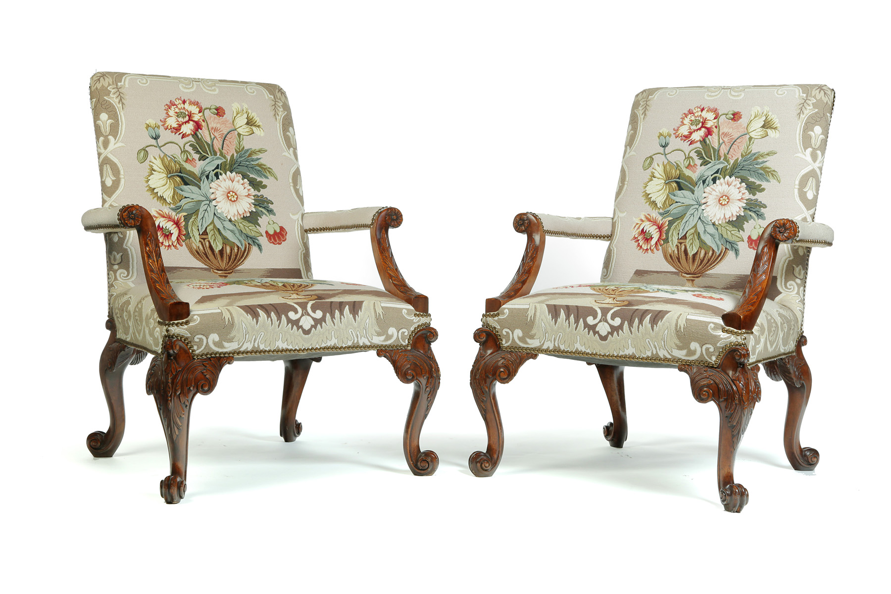 Appraisal: PAIR OF FRENCH ROCOCO-STYLE ARMCHAIRS Twentieth century mahogany Highly carved