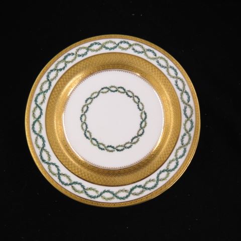 Appraisal: Minton Porcelain Bread Plates gold encrusted garland borders excellent