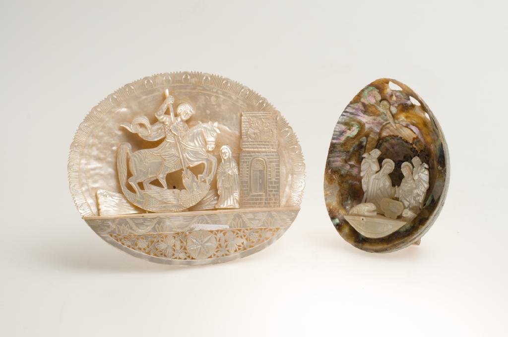 Appraisal: TWO th CENTURY MOTHER-OF-PEARL SHELL CARVINGS one carved as St