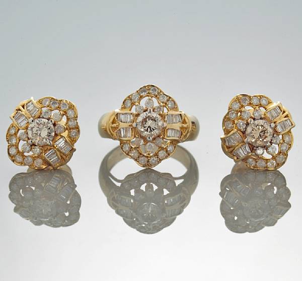 Appraisal: A set of diamond jewelry comprising a ring and pair