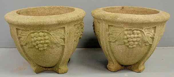 Appraisal: Pair of concrete planters with grape decoration h x dia