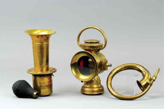 Appraisal: KLAXET HORN CARRY LAMP AND AUTO HORN Three accessories done