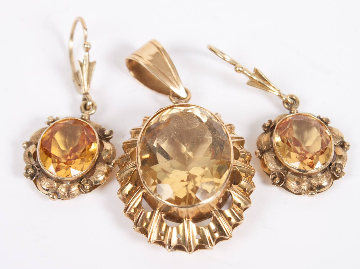 Appraisal: Lady's gold and citrine pendant earrings unmarked test as gold