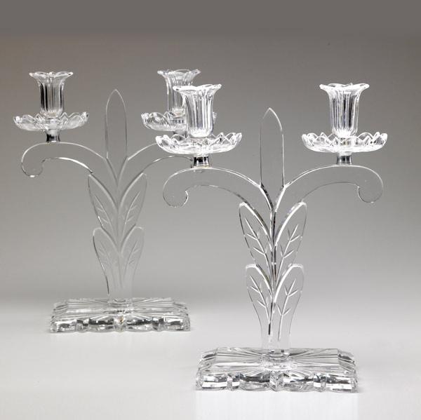 Appraisal: STEUBEN Pair of clear glass candelabra by Frederick Carder shaped