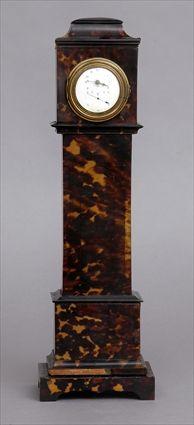 Appraisal: GEORGE II ENAMELED CLOCK FACE FITTED INTO A TORTOISESHELL MINIATURE