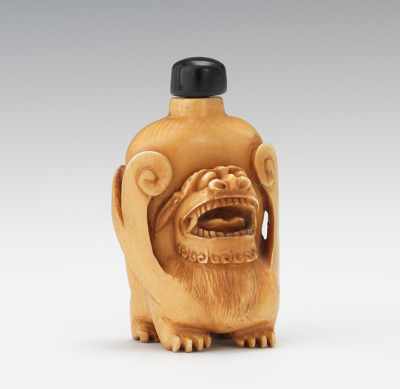 Appraisal: An Ivory Magnum Snuff Bottle with Carved Kylin Well carved