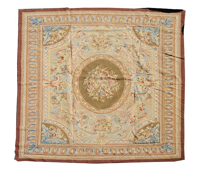 Appraisal: A SAVONNERIE STYLE TAPESTRY CARPET with central oval green ground