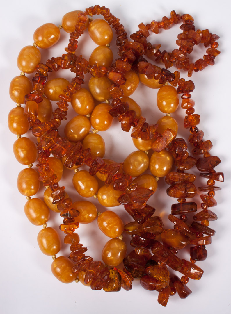 Appraisal: Three amber bead necklaces including a butterscotch amber beaded necklace