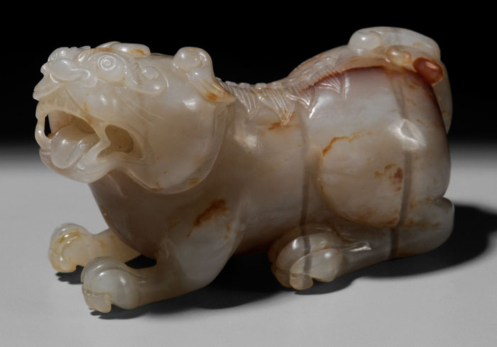 Appraisal: Agate Buddhist Lion Qing Dynasty grayish white with translucent bands