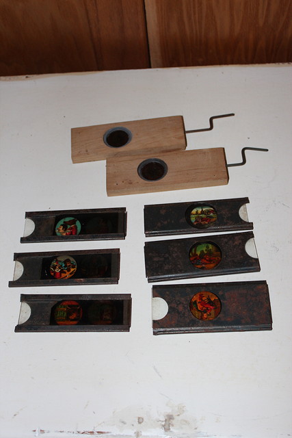 Appraisal: TWO HAND CRANKED WOOD FRAMED KALEIDOSCOPIC SLIDES X each and