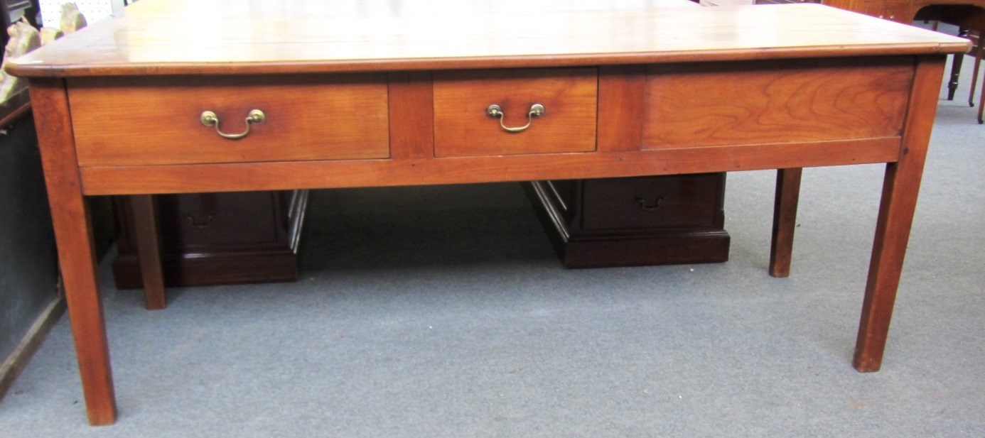 Appraisal: A th century French plank top cherry wood preparation table