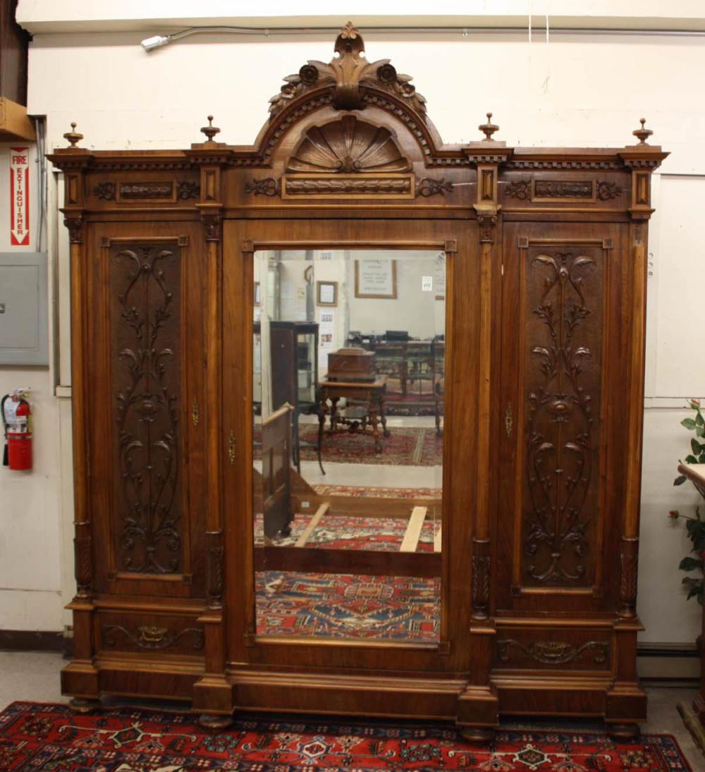 Appraisal: LARGE VICTORIAN WALNUT BREAKFRONT WARDROBE Continental th century centering a