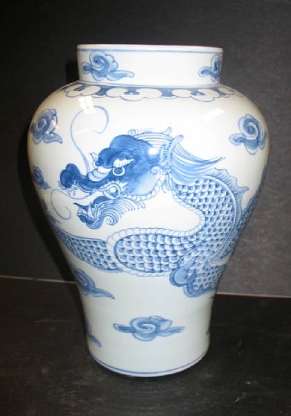 Appraisal: A reproduction blue and white porcelain dragon-decorated Jar th Century