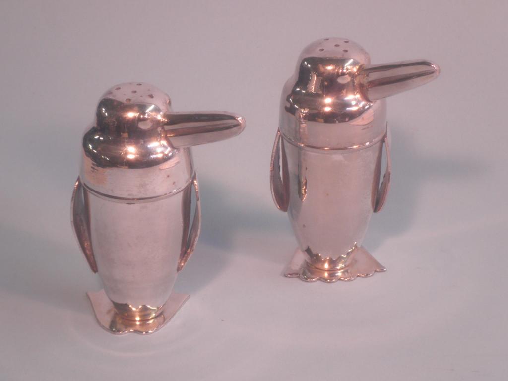 Appraisal: A s silver plated novelty pepper and salt each in