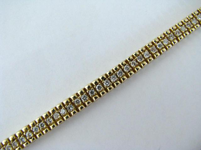 Appraisal: k yellow gold Rolex link style tennis bracelet containing round