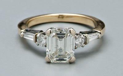 Appraisal: Lady's diamond engagement ring centering one emerald-cut diamond estimated weight