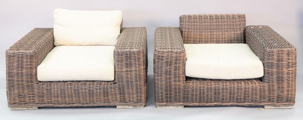 Appraisal: Pair of Rattan style outdoor oversized chairs plastic woven wicker