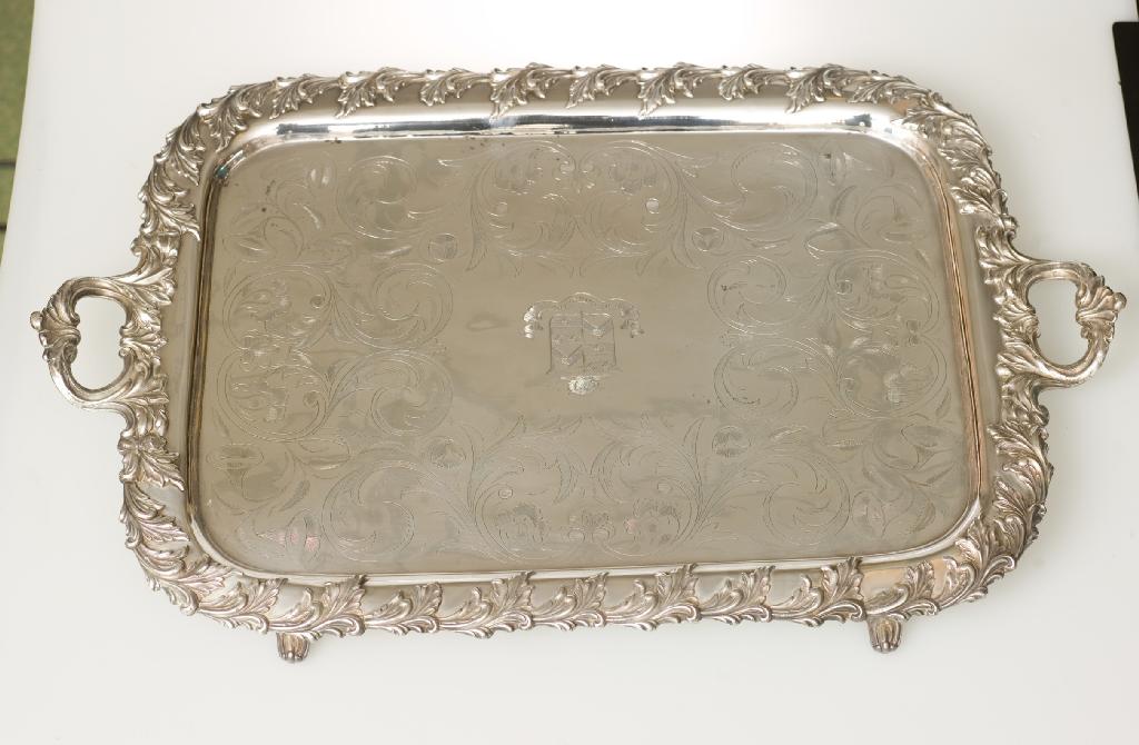 Appraisal: SILVER-PLATED TWO-HANDLED TEA TRAY of rectangular form centred by an