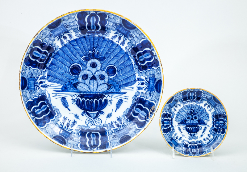 Appraisal: TWO DUTCH BLUE AND WHITE DELFT PEACOCK PLATES Marked in