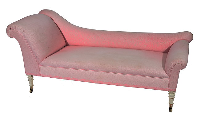 Appraisal: A VICTORIAN CHAISE LONGUE with shaped back and scroll ends