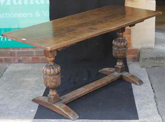 Appraisal: AN OAK REFECTORY STYLE TABLE of rectangular form with carved