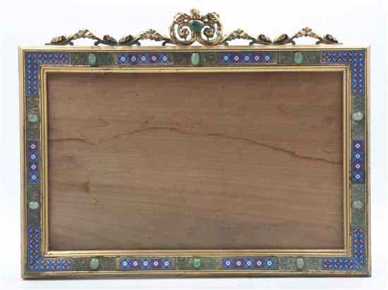 Appraisal: A Continental Gilt Metal and Champleve Frame of rectangular form