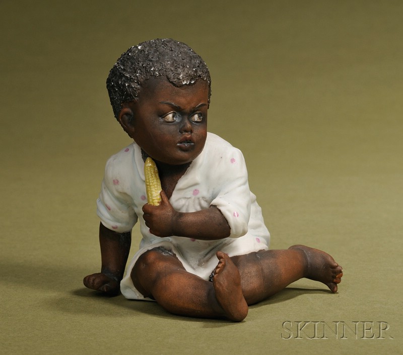 Appraisal: Heubach Black Boy with Corn Figurine Germany c tinted bisque