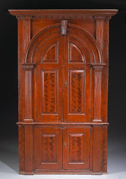 Appraisal: A Chippendale grain painted architectural corner cupboard late th century