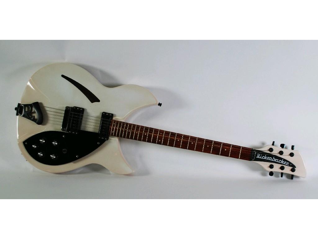 Appraisal: RICKENBACKER HOLLOW BODY SIX STRING ELECTRIC GUITAR white with black