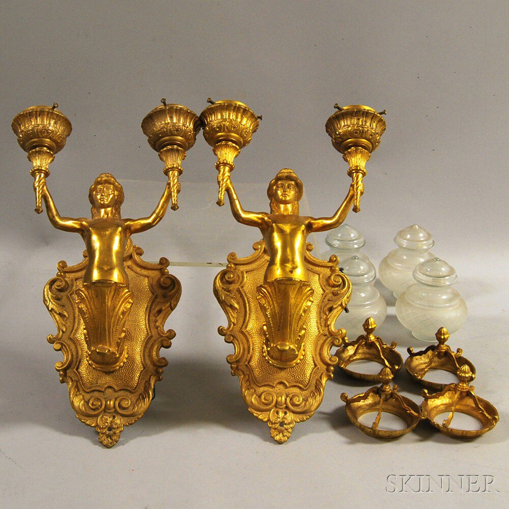 Appraisal: Pair of Gilt-metal Figural Electrified Two-light Wall Sconces th century