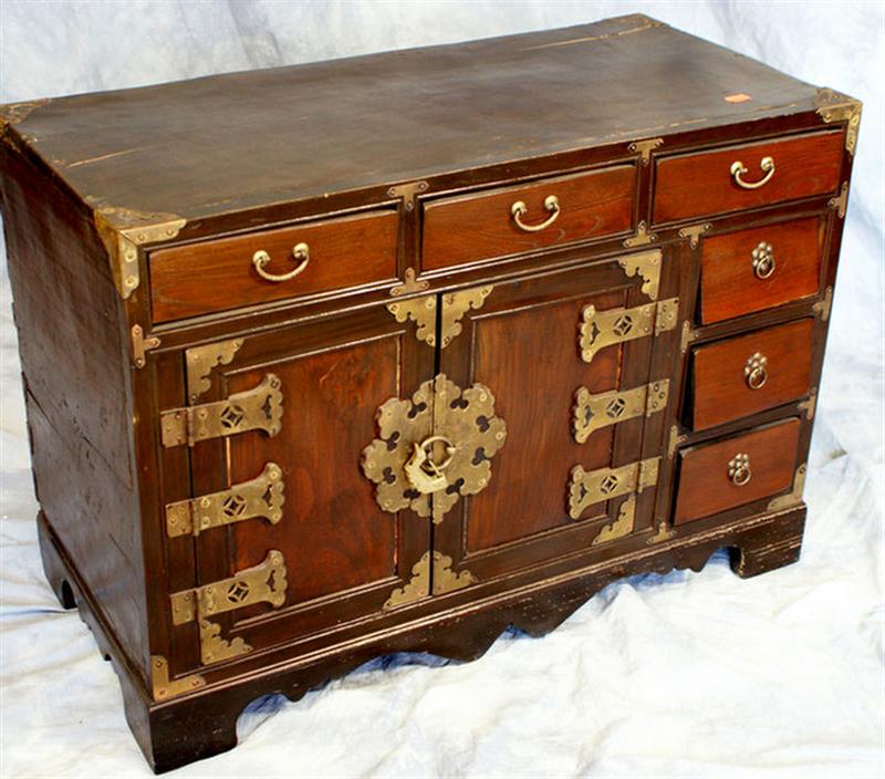 Appraisal: Oriental camphor wood chest with drawers and doors with brass