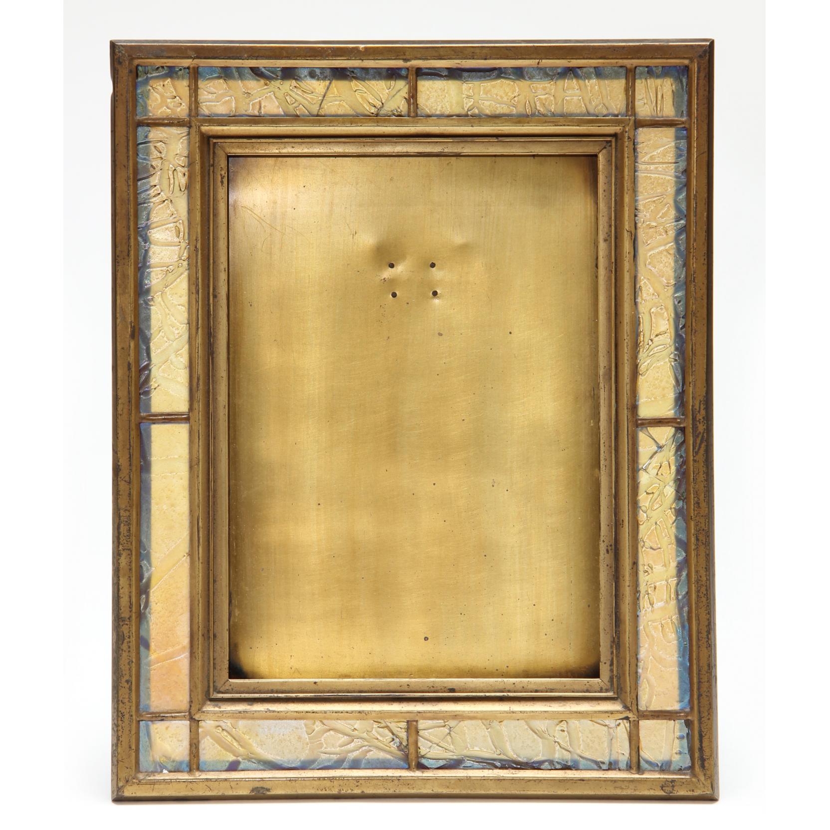 Appraisal: Tiffany Furnaces Bronze and Favrile Glass Frame warm brownish gold