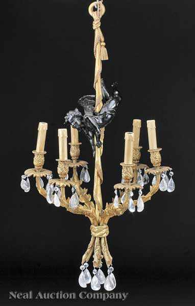 Appraisal: A Louis XVI-Style Dor Bronze Six-Light Chandelier the standard modeled