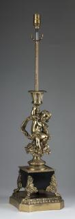 Appraisal: Continental style gilt brass lamp with putto h Gilt brass