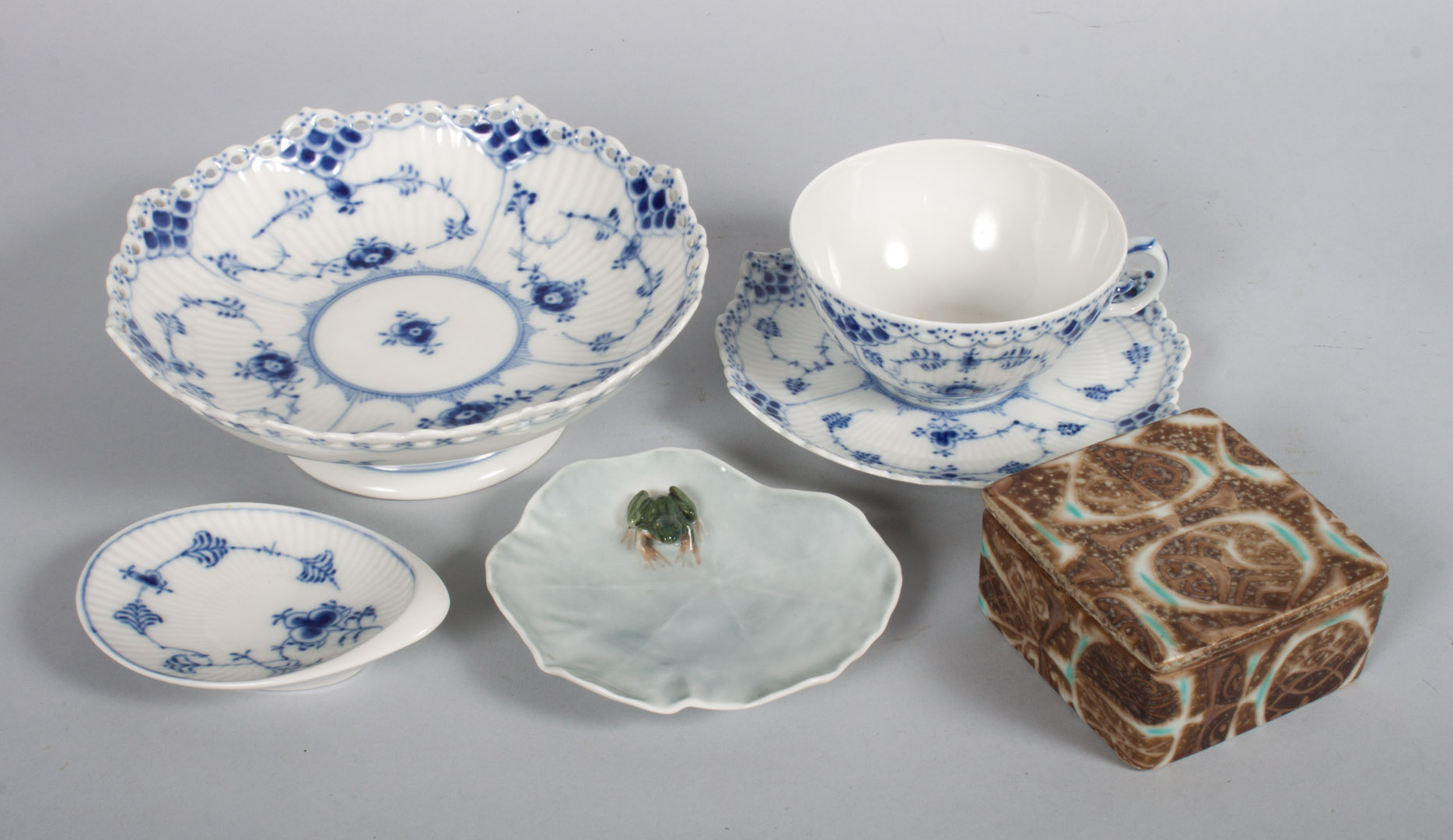 Appraisal: Royal Copenhagen porcelain tableware pieces of blue and white lace