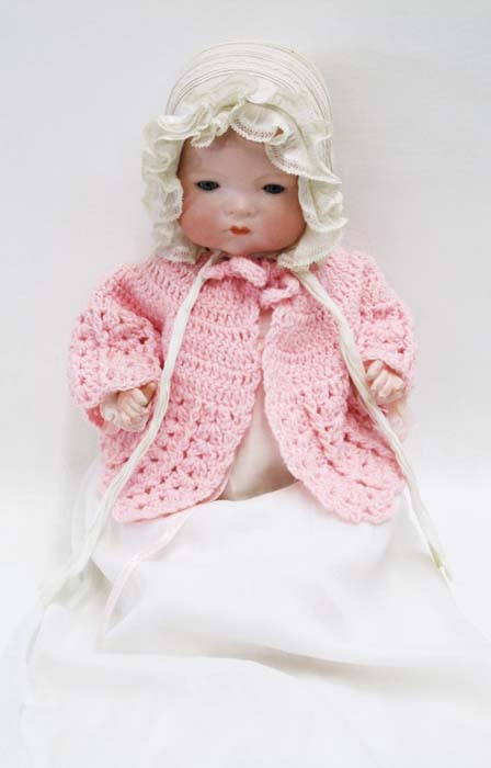 Appraisal: ARMOND MARSEILLES BISQUE SOCKET HEAD BABY DOLL marked Germany K