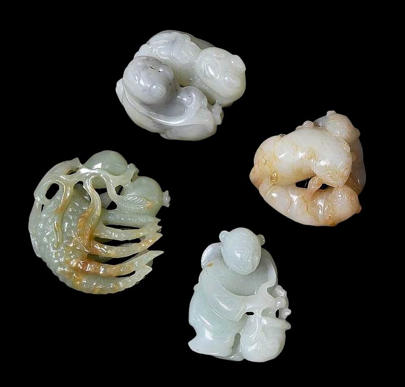 Appraisal: Four Jade and Hardstone Objects Chinese cats with butterfly boy