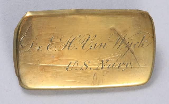 Appraisal: Brass and lead name plaque engraved Dr E H Van