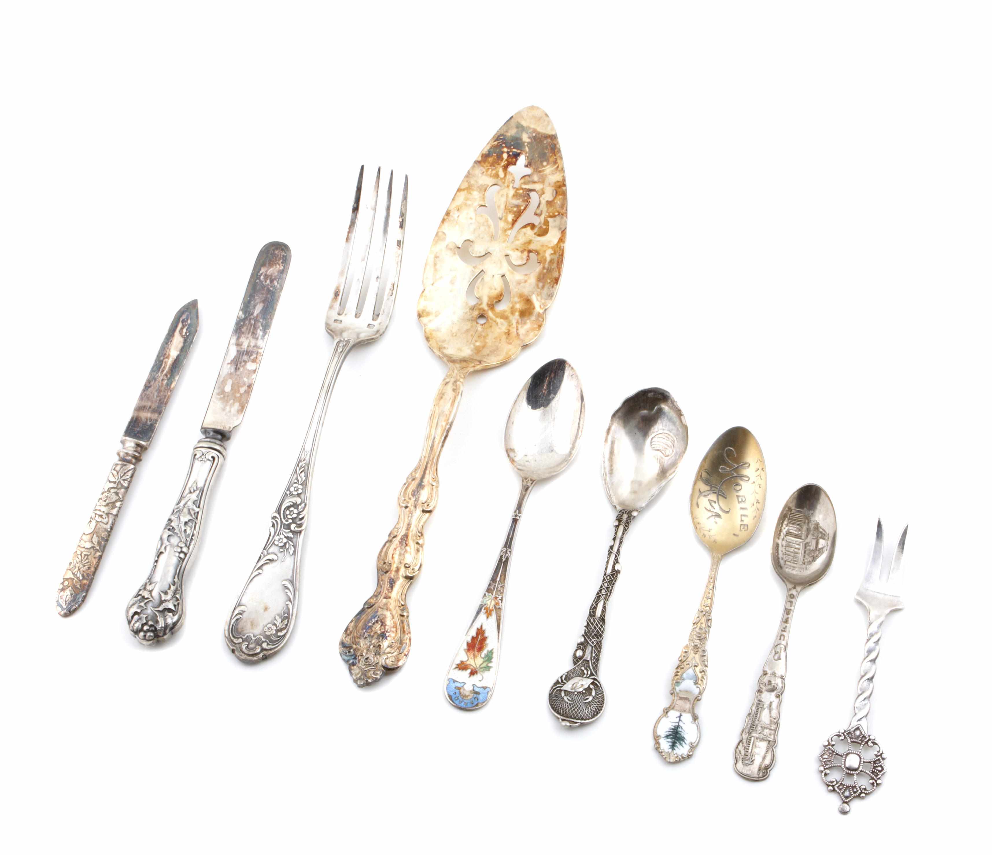 Appraisal: A group of sterling and plated flatware with a wooden