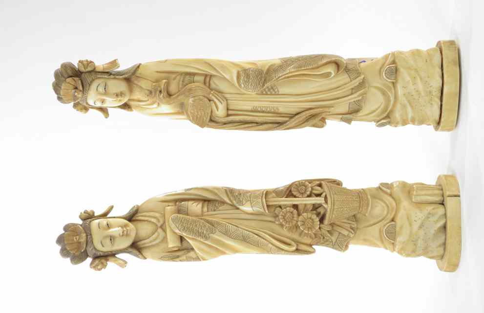 Appraisal: PAIR IVORY CARVED CHINESE FIGURES OF GUAN-YIN both standing One