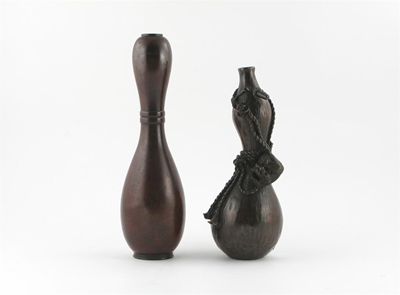 Appraisal: Two Japanese bronze gourd-shaped vases one tied with a bronze