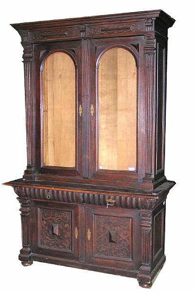 Appraisal: A Renaissance Revival oak bookcase cabinet third quarter th century